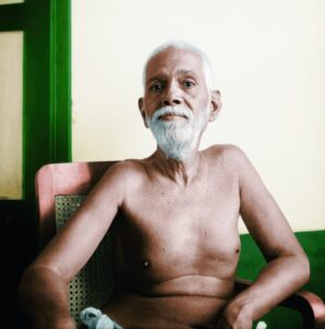 Ramana Maharshi - Color Photo in Chair